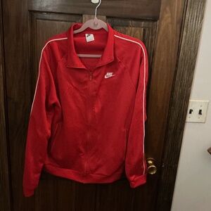 Red Nike large women’s jacket 22” pit to pit  27 “ long
